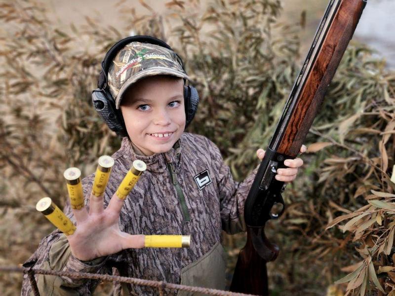 Seth Almond of Camden, 9 years old, hunting ducks in Buenos Aires Province in Argentina