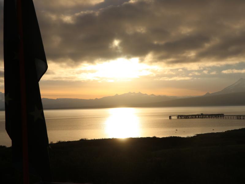 wings in alaska sunset over water