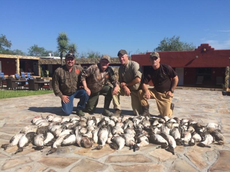 Wings duck hunters with duck trophies in Mexico