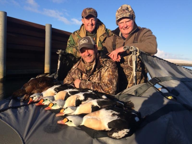 wings duck hunters with duck trophies